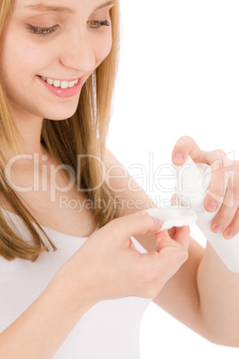 Acne facial care teenager woman apply cream