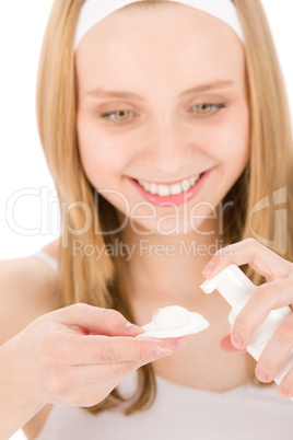 Acne facial care teenager woman apply cream