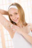 Beauty body care teenager woman apply deodorant