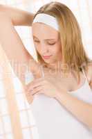 Beauty body care teenager woman apply deodorant