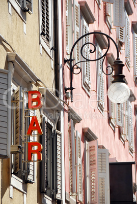 Street lamp and bar sign