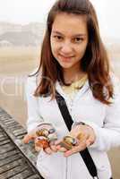 Teenage girl with shells