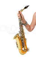 Saxophone in the women's hand