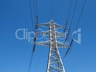 Steel support of overhead power transmission line on sky background