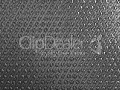 Carbon fibre background with round shapes
