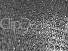 Carbon fibre surface with round buttons