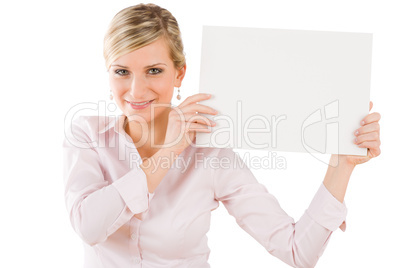 Happy businesswoman holding up empty banner