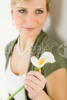 Portrait of calla lily flower woman in background