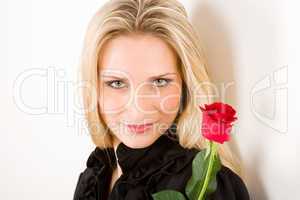 Elegant woman hold red rose