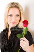 Elegant sexy woman hold red rose