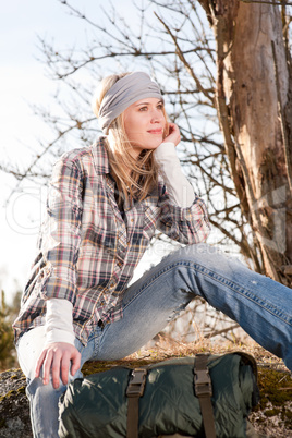 Portrait camping young woman backpack in country