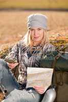 Camping young woman search navigation compass map
