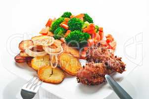 Fried potatoes broccoli carrots and roasted chicken