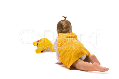 Baby Girl Crawling Towards Toy