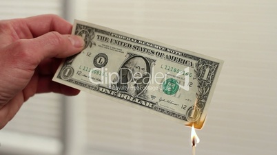 Dollar bill set on fire