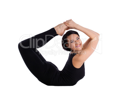 woman back bends yoga - bow pose and smile