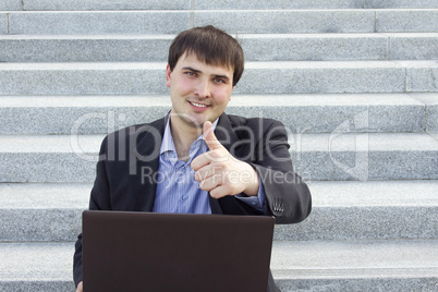 Modern business man thumbs up