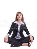 Attractive young business woman sit  in yoga asana