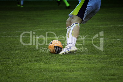 Kicking the Ball during a Football Match