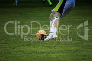 Kicking the Ball during a Football Match
