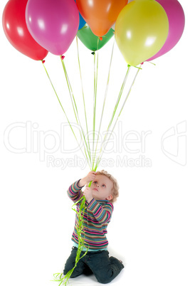 Little cute girl with multicolored air balloons