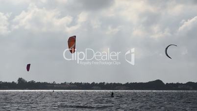 Kitesurfers in action
