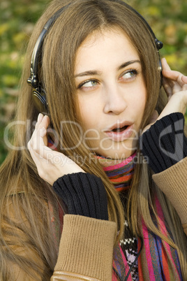 Young attractive woman with headphones