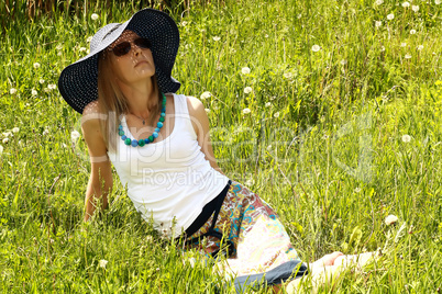 girl in hat and spectacles