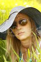 portrait girl in hat and spectacles