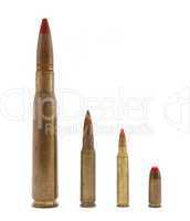 Four red-tipped tracer cartridges of various calibers isolated