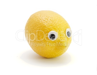 Funny lemon fruit with eyes on white background