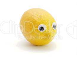 Funny lemon fruit with eyes on white background