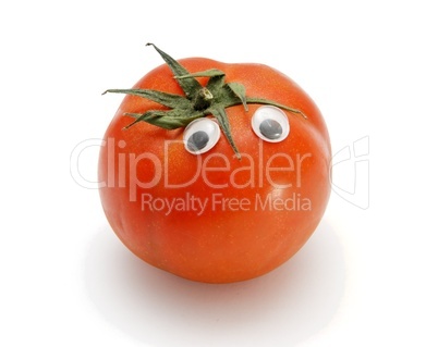 Funny red tomato with eyes on white background