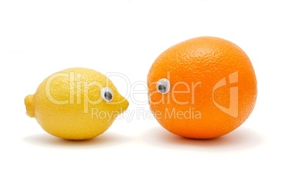 Funny lemon and orange with eyes isolated