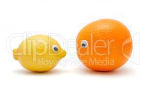 Funny lemon and orange with eyes isolated