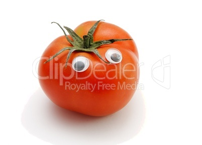 Funny red tomato with eyes on white background