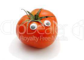 Funny red tomato with eyes on white background
