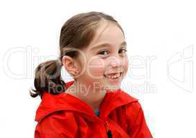 Smiling seven years girl with pigtails