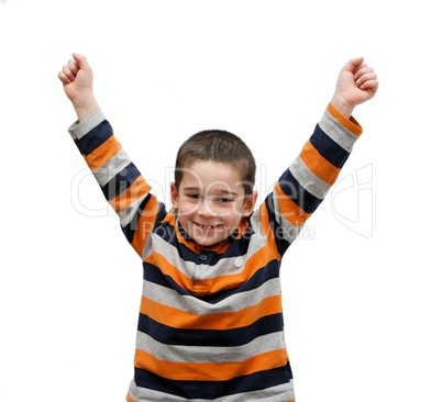Cute little boy rises his arms in a V-sign