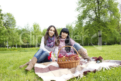 Mother and daughter relaxing outdoors