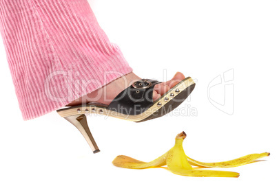 Female leg(foot) and peel of a banana. Life insurance.