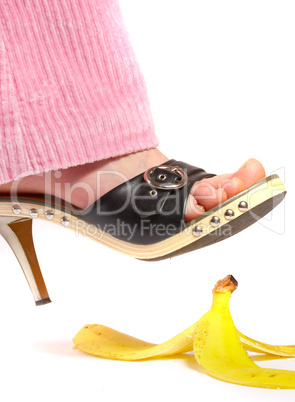 Female leg(foot) and peel of a banana. Life insurance.