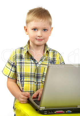 The boy the blonde is engaged with a computer