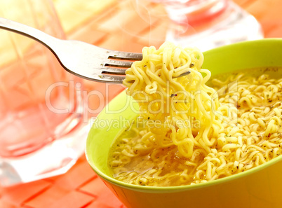 Hot and tasty noodles on a plug.