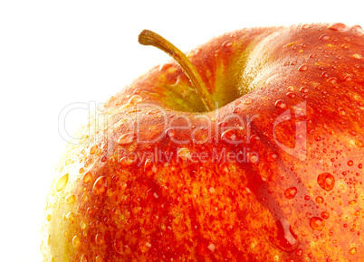Fresh apple with drops of water.