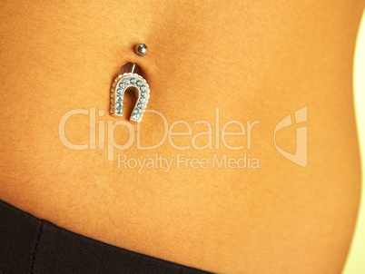 female navel with piercing