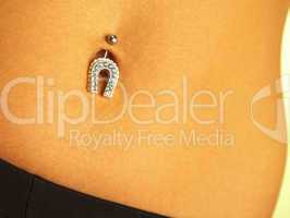 female navel with piercing