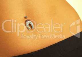 female navel with piercing