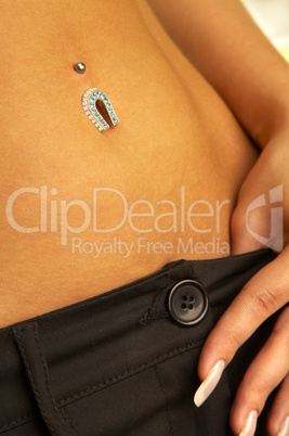 female navel with piercing