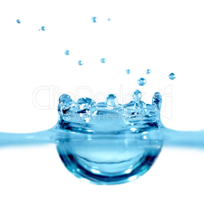 Falling drop of blue water